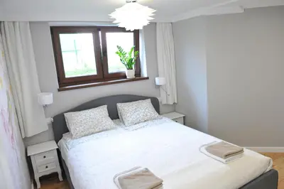 Łóżko lub łóżka w pokoju w obiekcie Apartament Bystrzyca Kłodzka