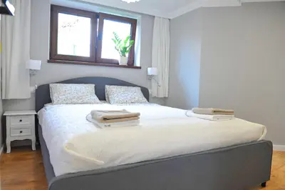 Łóżko lub łóżka w pokoju w obiekcie Apartament Bystrzyca Kłodzka