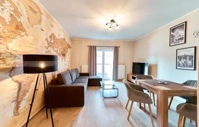 Telewizja i/lub zestaw kina domowego w obiekcie LAGUNA Apartament Podróżnika 22 Wille Parkowe