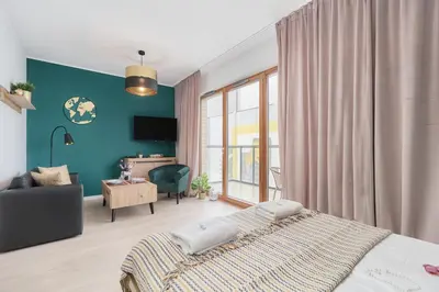 Łóżko lub łóżka w pokoju w obiekcie Apartment Wrocław Na Bulwarach by Noclegi Renters