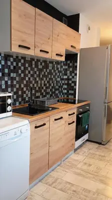 Kuchnia lub aneks kuchenny w obiekcie Apartament Leśny