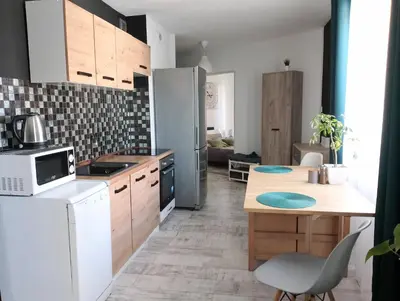 Kuchnia lub aneks kuchenny w obiekcie Apartament Leśny