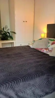 Łóżko lub łóżka w pokoju w obiekcie Apartament na Kruczej