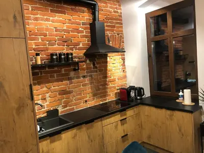 Kuchnia lub aneks kuchenny w obiekcie Stylowy apartament tuż przy Rynku
