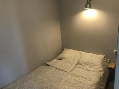 Łóżko lub łóżka w pokoju w obiekcie Apartament Sikornik