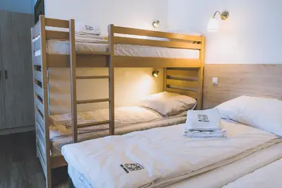 Łóżko lub łóżka w pokoju w obiekcie Owca z widokiem