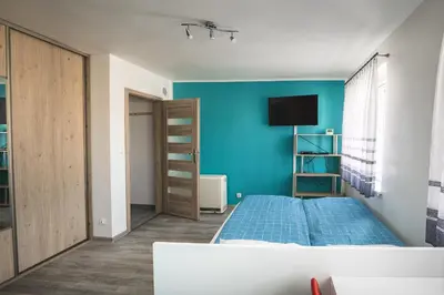 Łóżko lub łóżka w pokoju w obiekcie High Floor Vision Apartment