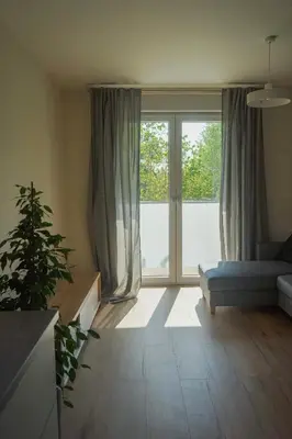 Łóżko lub łóżka w pokoju w obiekcie Przytulne mieszkanie w cichej okolicy