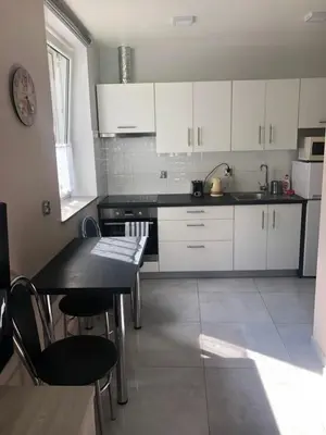 Kuchnia lub aneks kuchenny w obiekcie Za Rogiem2