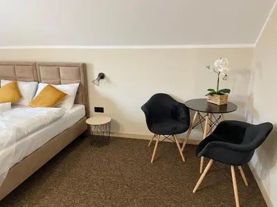 Łóżko lub łóżka w pokoju w obiekcie Villa Marta