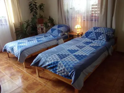 Łóżko lub łóżka w pokoju w obiekcie Agroturystyka u Willima
