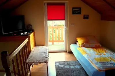 Łóżko lub łóżka w pokoju w obiekcie Agroturystyka u Willima