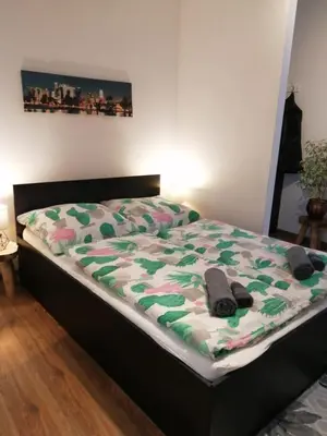 Łóżko lub łóżka w pokoju w obiekcie Przy rynku