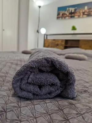 Łóżko lub łóżka w pokoju w obiekcie Przy rynku