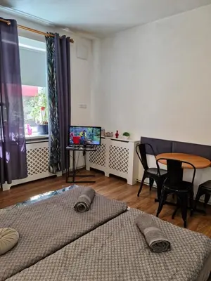 Telewizja i/lub zestaw kina domowego w obiekcie Przy rynku