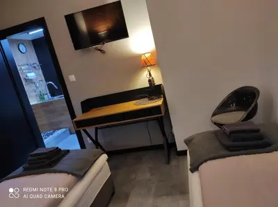 Telewizja i/lub zestaw kina domowego w obiekcie Apartament Aurora Kletno