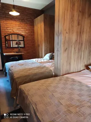 Łóżko lub łóżka w pokoju w obiekcie Apartament Aurora Kletno