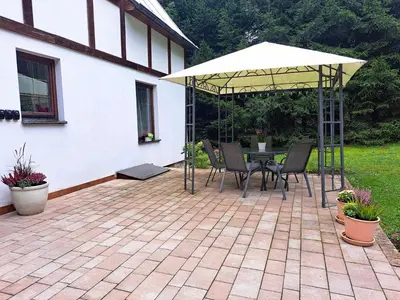 Patio lub wspólna przestrzeń na świeżym powietrzu w obiekcie Pensjonat Pod Świerkami
