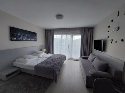 Łóżko lub łóżka w pokoju w obiekcie Czarna Góra Apartament STUBAI 5