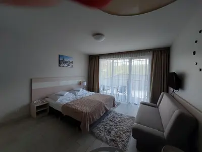 Łóżko lub łóżka w pokoju w obiekcie Czarna Góra Apartament ISCHGL 18