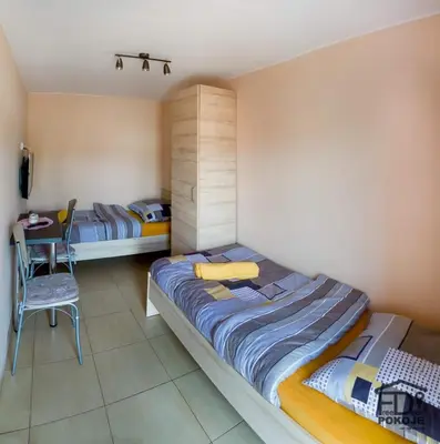 Łóżko lub łóżka w pokoju w obiekcie Pokoje FreeDoor