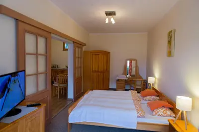 Łóżko lub łóżka w pokoju w obiekcie Apartamenty Miranda