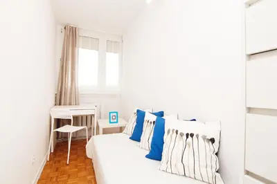 Łóżko lub łóżka w pokoju w obiekcie Blue River - Jelenia