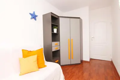 Łóżko lub łóżka w pokoju w obiekcie Blue River - Jelenia
