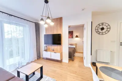 Telewizja i/lub zestaw kina domowego w obiekcie LAGUNA Apartament Polanica Residence 45