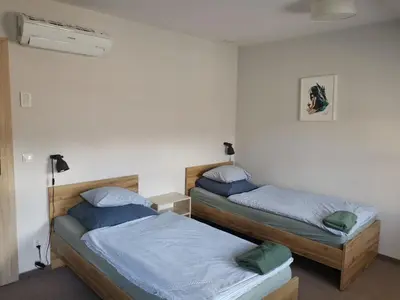 Łóżko lub łóżka w pokoju w obiekcie Bemma Apart