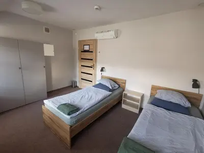 Łóżko lub łóżka w pokoju w obiekcie Bemma Apart