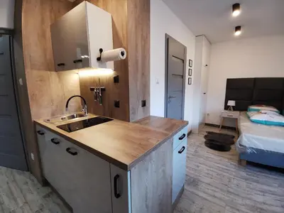 Kuchnia lub aneks kuchenny w obiekcie Apartamenty Majówka