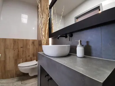 Łazienka w obiekcie Apartamenty Majówka
