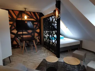 Łóżko lub łóżka w pokoju w obiekcie Apartamenty Majówka