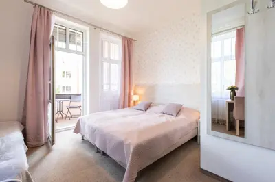 Łóżko lub łóżka w pokoju w obiekcie Villa Elizabeth