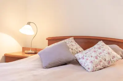 Łóżko lub łóżka w pokoju w obiekcie Villa Elizabeth