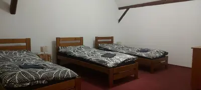 Łóżko lub łóżka w pokoju w obiekcie Siedlisko Waliszówka