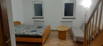 Łóżko lub łóżka w pokoju w obiekcie Siedlisko Waliszówka