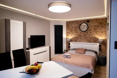 Łóżko lub łóżka w pokoju w obiekcie Apartament Martyna