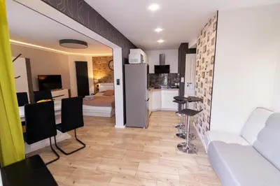 Telewizja i/lub zestaw kina domowego w obiekcie Apartament Martyna