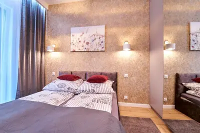 Łóżko lub łóżka w pokoju w obiekcie LAGUNA Apartament Polanica Residence 2