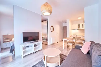 Telewizja i/lub zestaw kina domowego w obiekcie LAGUNA Apartament Polanica Residence 29