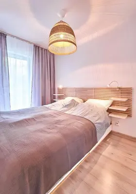 Łóżko lub łóżka w pokoju w obiekcie LAGUNA Apartament Polanica Residence 29