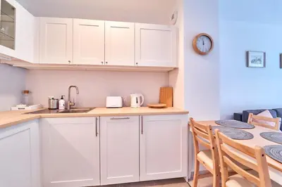 Kuchnia lub aneks kuchenny w obiekcie LAGUNA Apartament Polanica Residence 29