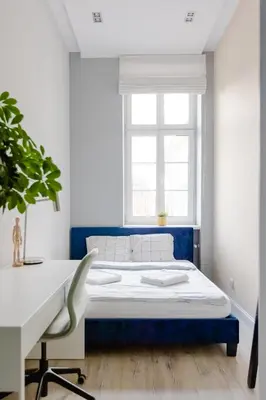 Łóżko lub łóżka w pokoju w obiekcie Elegant 2BR, Amazing Old Town Views, Plac Solny Walk to Rynek! Amenities