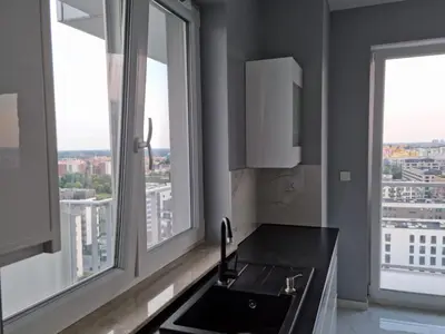 Kuchnia lub aneks kuchenny w obiekcie Wroclaw Penthouse Views Odra and City Center