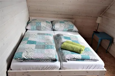 Łóżko lub łóżka w pokoju w obiekcie Domek pod Ślężą