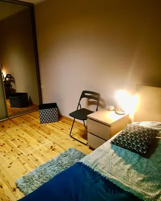 Łóżko lub łóżka w pokoju w obiekcie „Kredka i Ołówek” Apartment