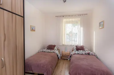 Łóżko lub łóżka w pokoju w obiekcie przystanek Kudowa