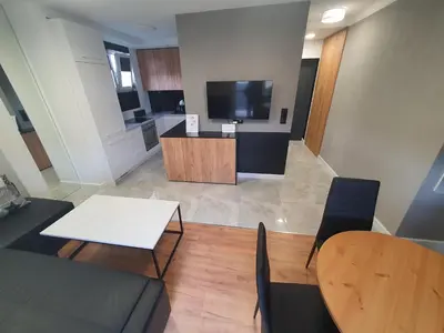 Telewizja i/lub zestaw kina domowego w obiekcie JDK Apartamenty Mickiewicza 34m2 4-osobowy